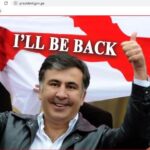 Mixail Saakaşvilinin fotosu və “Mən qayıdacağam” sözləri